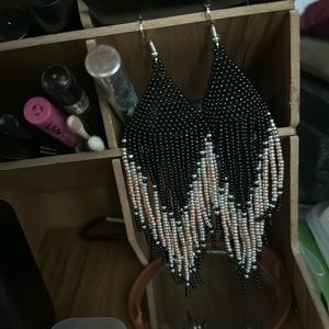 Dangling earrings Black gold copper and silver coloured beads.